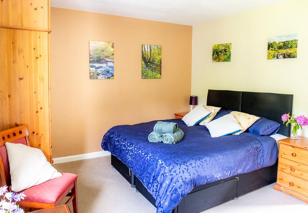 Dart room set up as kingsize double