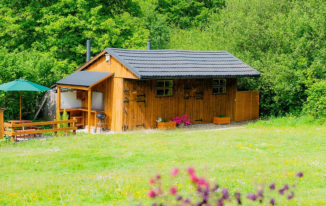 Stables Eco-Bothies from across the garden