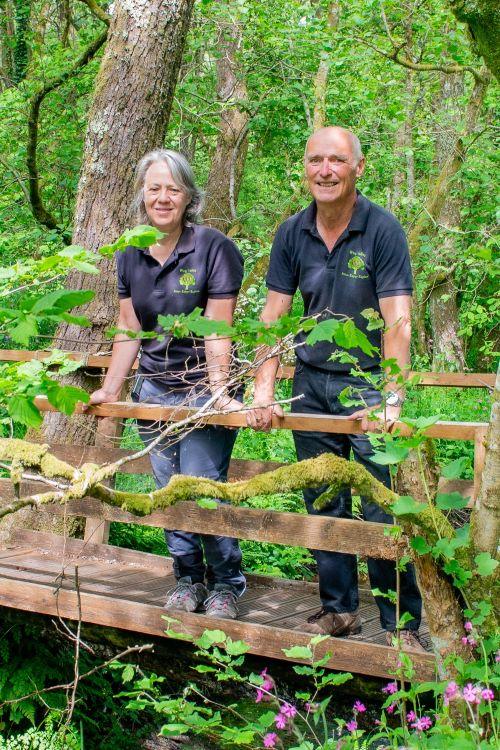 Michelle & Kevin on the bridge over the Wray Brook wearing Wray Valley polo shirts